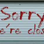 closed sign on store front