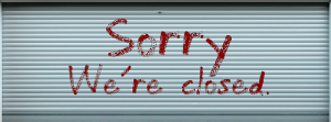 closed sign on store front