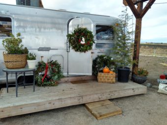 air stream trailer boutique with Christmas wreath